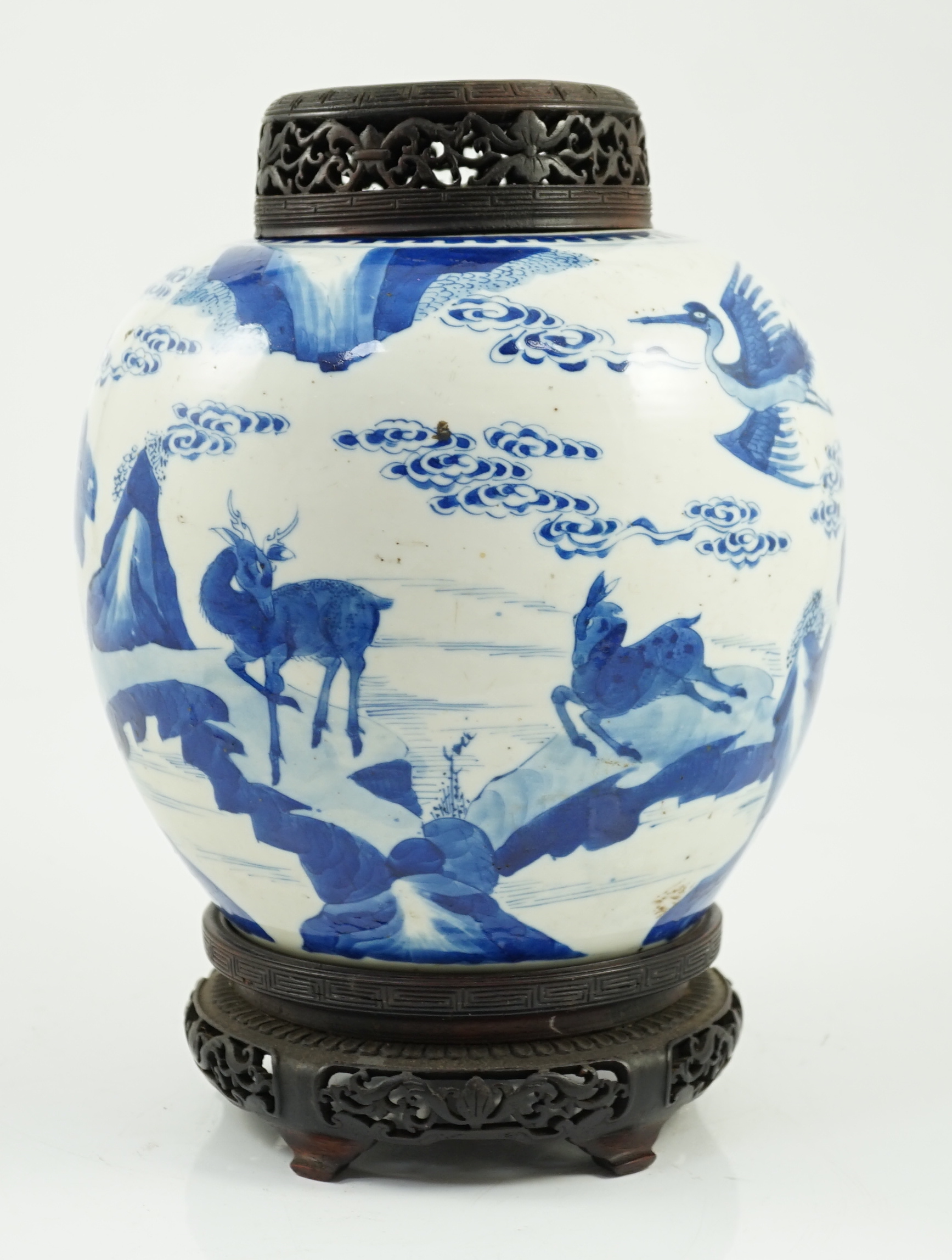 A Chinese blue and white ‘deer and crane’ ovoid jar, Kangxi period